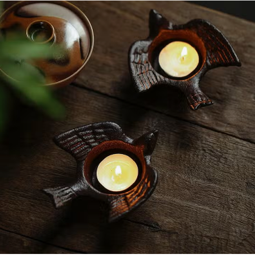 
                  
                    Cast Iron Sitting Bird Candle Holder
                  
                