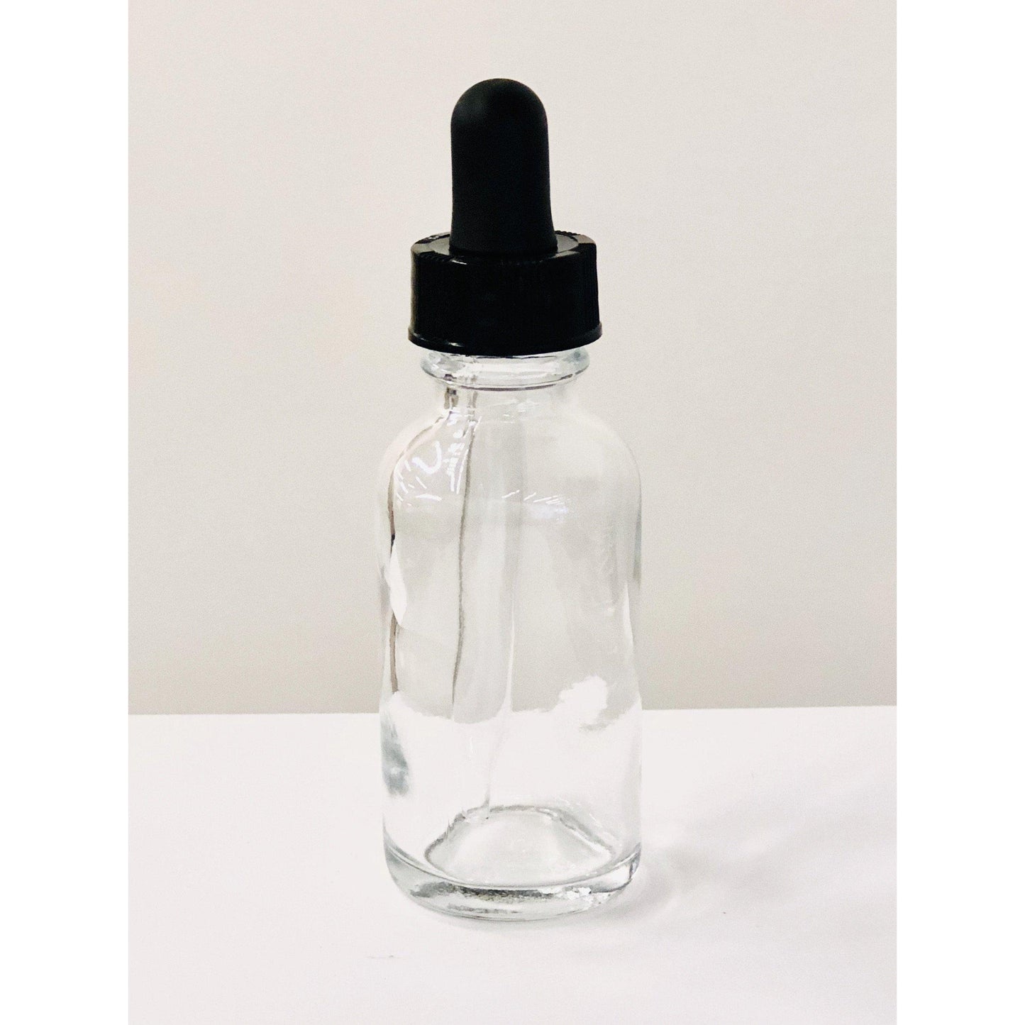 
                  
                    Clear 1 oz. Glass Bottles
                  
                